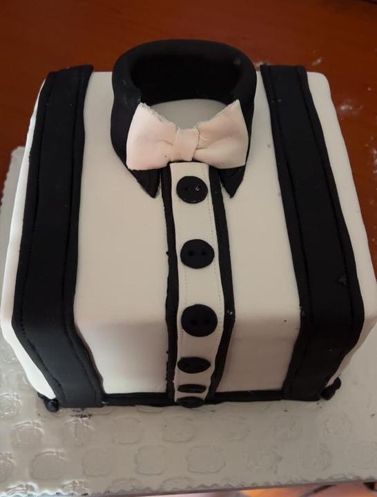 Cake shaped like a shirt with a bow tie